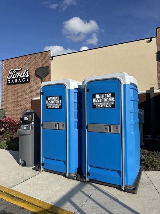 Retreat Restrooms portable restrooms with a hand-washing station