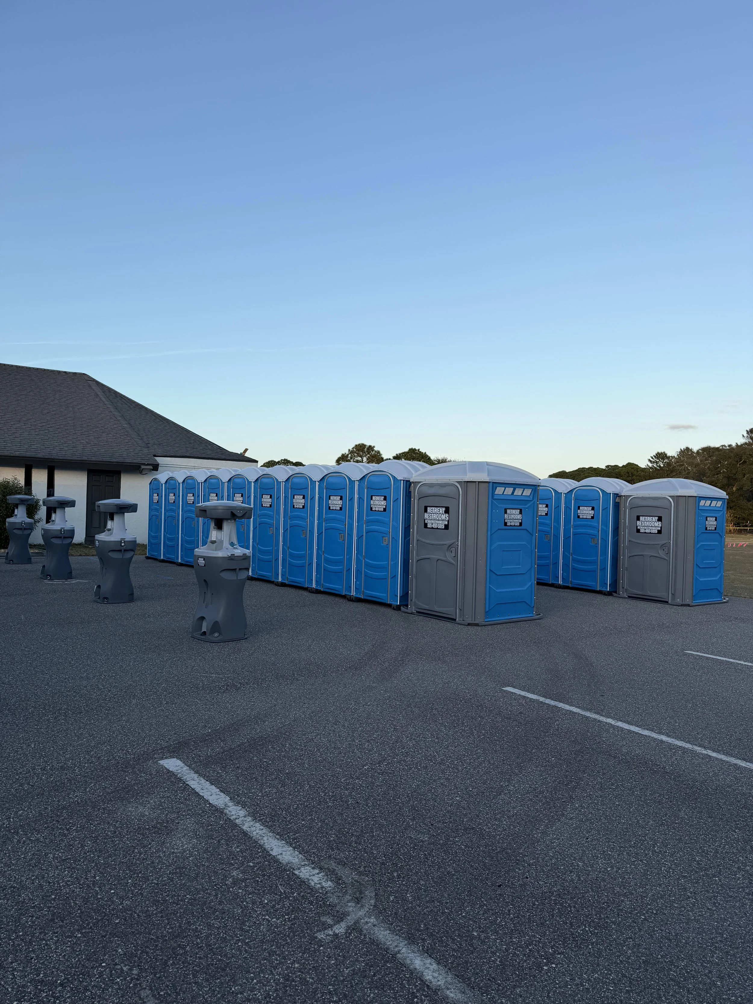Portable restrooms serving an outdoor event